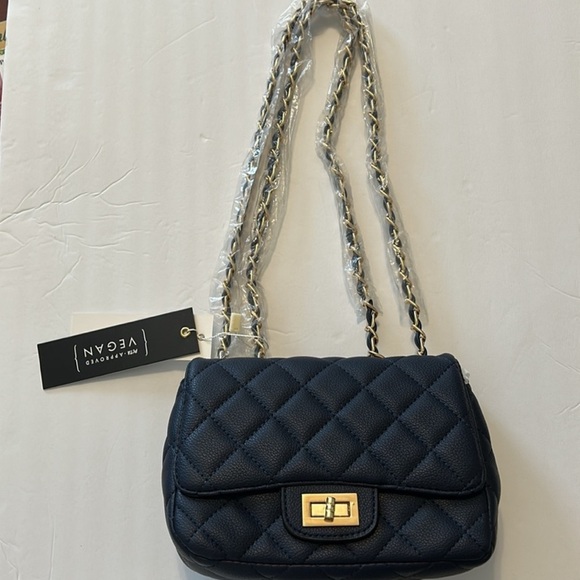 Scratch and Water Resistant Shoulder
Bag Navy Blue Mini Quilted VEGAN
LEATHER - Picture 1 of 13